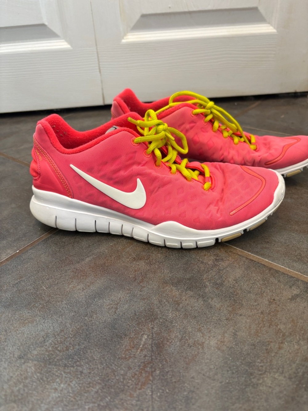 Nike Women’s Pink Athletic Sneakers with Yellow Laces